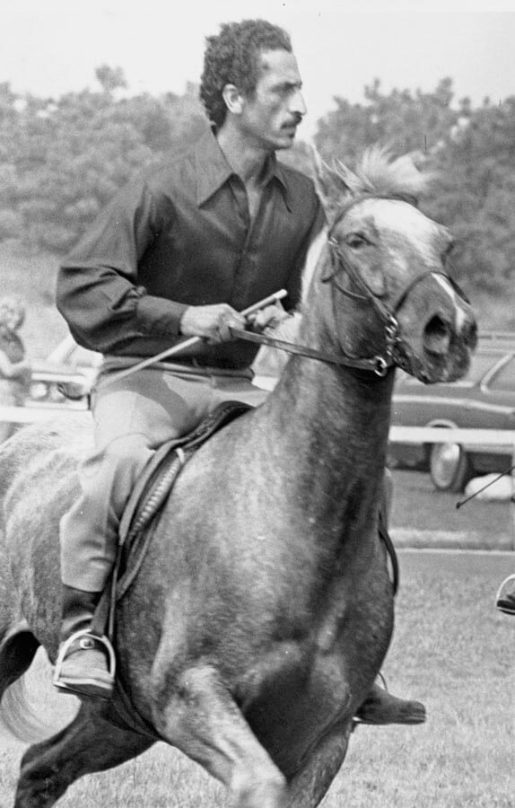 Man ridding a horse.